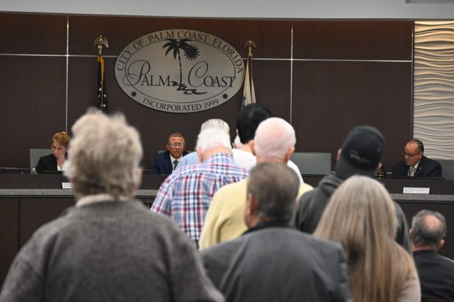 Most of the people who addressed the Palm Coast City Council in the meeting's opening public comment segment lent support to Mayor Mike Norris. (© FlaglerLive)