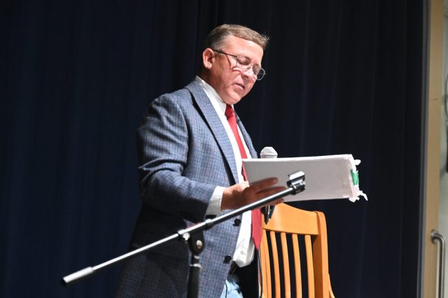 Mike Norris told the audience he did not receive the council's ethics complaint against him for weeks , suggesting city staff had intentionally sat on it. (© FlaglerLive)