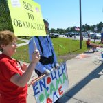 They almost get their wish, 13 years later: a tea party demonstration on Palm Coast Parkway on March 26, 2012. (© FlaglerLive)