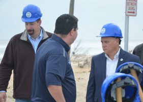 Commissioner Donald O'Brien, seen here at the kick-off of the dunes restoration project with Sen. Travis Hutson and Coffey, may need the hard hat at the next couple of commission meetings: he's now the panel's chairman.  (© FlaglerLive)