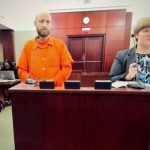 John Fehrman with Assistant Public Defender Melissa MacNicol before Circuit Judge Dawn Nichols on Wednesday. (© FlaglerLive via zoom)