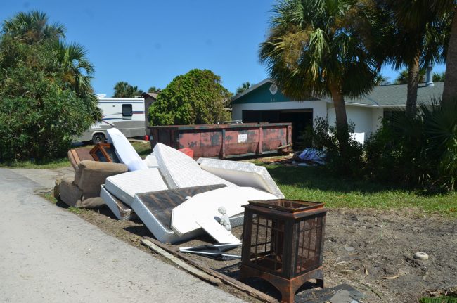 Dumpsters have been brought in on Ocean Palms. Click on the image for larger view. (c FlaglerLive)