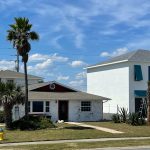 Doug O'Connor has been building the house to the right for the past year, at times angering Wayne Herboldt, owner of the house to the left. The property line was the scene of a confrontation that resulted in Herboldt's arrest on Tuesday. (© FlaglerLive)