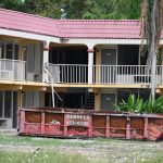 There's been some work done at the old Country Hearth Inn on Old Dixie Highway, but not enough, according to Flagler County government. (© FlaglerLive)