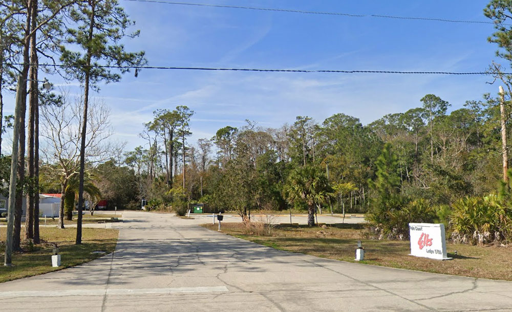 The shooting took place on Old Kings Road. The victim and his girlfriend pulled into the Elks Lodge property to wait for paramedics. (Google)