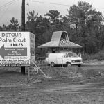 An image the late Flagler County Historical Society historian Sisco Deen circulated to his email list in 2017 with the following explanation: “A Palm Coast sign marker at Old Kings and Moody Boulevard points visitors to the welcome center in this 1979 photograph. The sign includes information about a new shopping center, which would become the Palm Harbor Shopping Village and is now Island Walk.” (Flagler County Historical Society) 