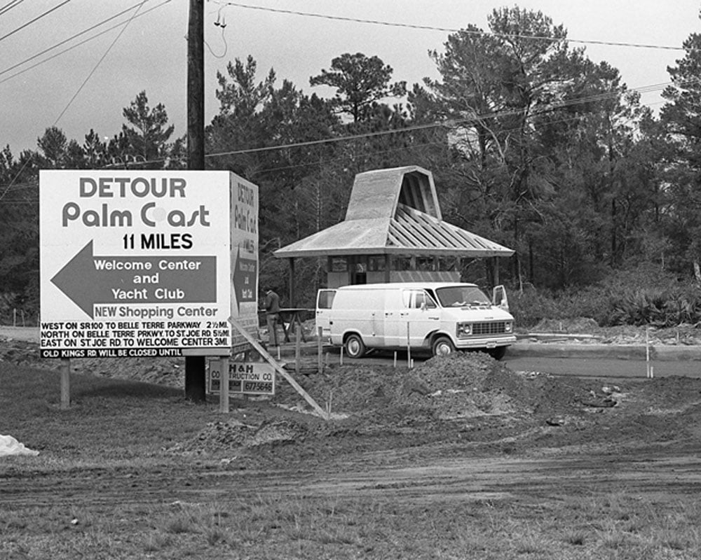 An image the late Flagler County Historical Society historian Sisco Deen circulated to his email list in 2017 with the following explanation: “A Palm Coast sign marker at Old Kings and Moody Boulevard points visitors to the welcome center in this 1979 photograph. The sign includes information about a new shopping center, which would become the Palm Harbor Shopping Village and is now Island Walk.” (Flagler County Historical Society) 