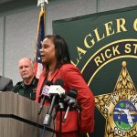 Superintendent LaShakia Moore with Sheriff Rick Staly and School Board Chair Will Furry during a press conference last May. (© FlaglerLive)