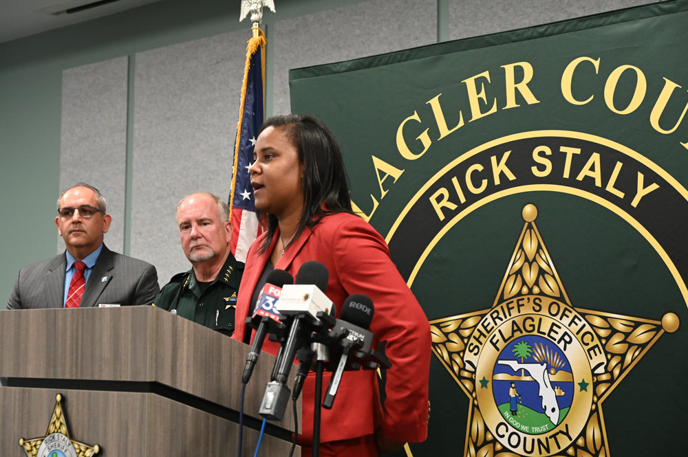 Superintendent LaShakia Moore with Sheriff Rick Staly and School Board Chair Will Furry during a press conference last May. (© FlaglerLive)