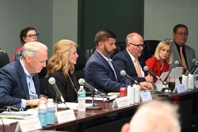 From left, Cliff Shepard, the attorney representing the Ormond Beach City Commission in the dispute, and commissioners Lori Tolland, ravis Sargent, Mayor Bill Partington, commissioners Susan Persis and Harold Briley. (© FlaglerLive)