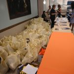 A small hill of emergency-preparedness kits welcomed particip[ants at the disaster expo at the Palm Coast Community Center on Tuesday. (© FlaglerLive)