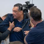 U.S. Sen. Alex Padilla of California is pushed out of the room after he interrupted Homeland Security Secretary Kristi Noem during a news conference in Los Angeles on June 12, 2025.