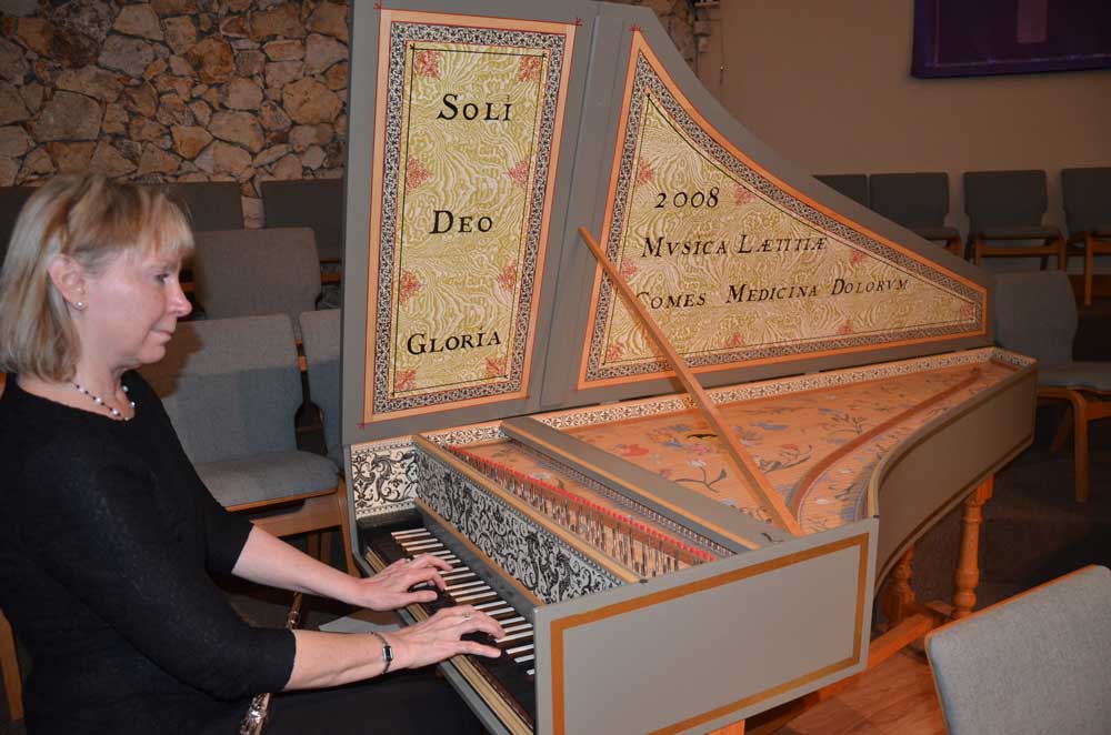 Paige Dashner Long, at the harpsichord, is the director of the Palm Coast Chamber Players. (© FlaglerLive)