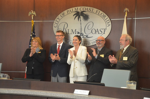 Four of the five Palm Coast City Council members are ready to see Jim Landon gone and have their own choice in the manager's chair. (© FlaglerLive)
