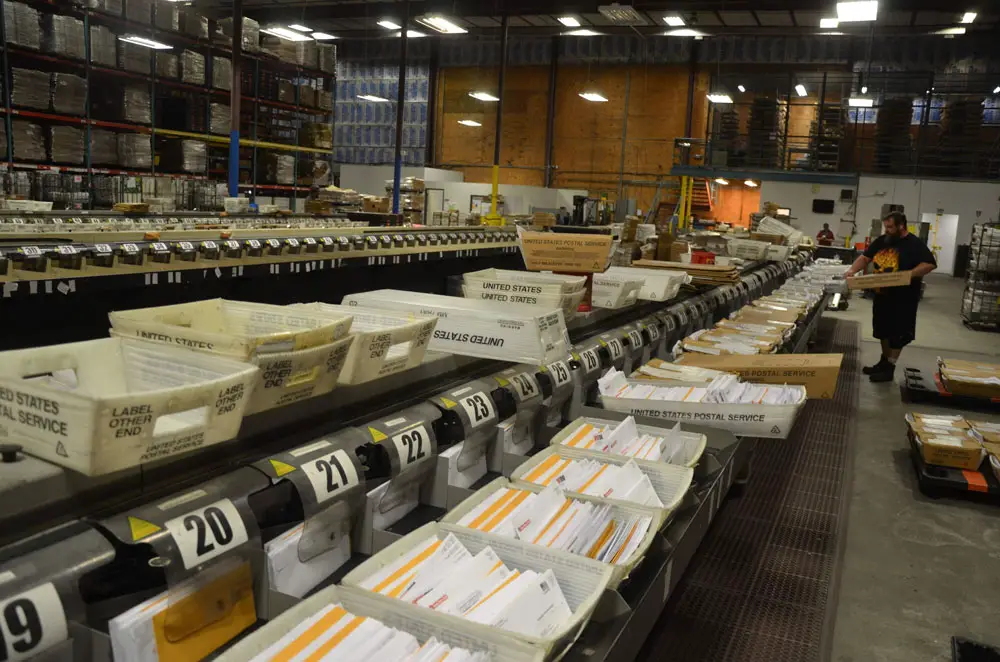 At its apex Palm Coast Data processed some 12 million pieces of mail a year. The company will now outsource that aspect of its operations and leave its long-time home on Commerce Boulevard. (© FlaglerLive)