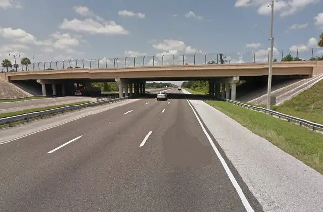 The Palm Coast Parkway overpass at I-95 will not be cluttered with an expensive 'Palm Coast' sign, the city council declared. (© FlaglerLive)