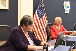 County Commissioner Pam Richardson, in a switch, now opposes raising the sales tax to fund beach management. She joined Commissioner Kim Carney, right, in opposition. Commissioner Leann Pennington has always opposed the plan. (© FlaglerLive)