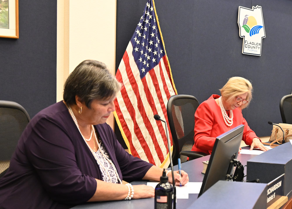 County Commissioners Pam Richardson and Kim Carney. (© FlaglerLive)
