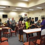 Some of the participants at Thursday evening's public forum at Buddy Taylor Middle School's library. The state School Board Association's Bill Vogel and John Reichert are to the left. (© FlaglerLive)