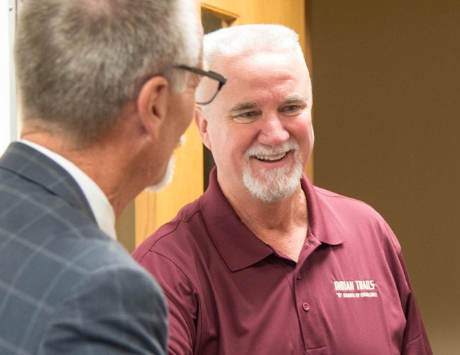 Paul Peacock with Superintendent Jim Tager Tuesday. (Flagler Schools)