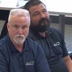Paul peacock, with Chris Tincher, Wadsworth Elementary's assistant principal, at right, in a recent appearance before the school board. (© FlaglerLive via Flagler Schools TV)
