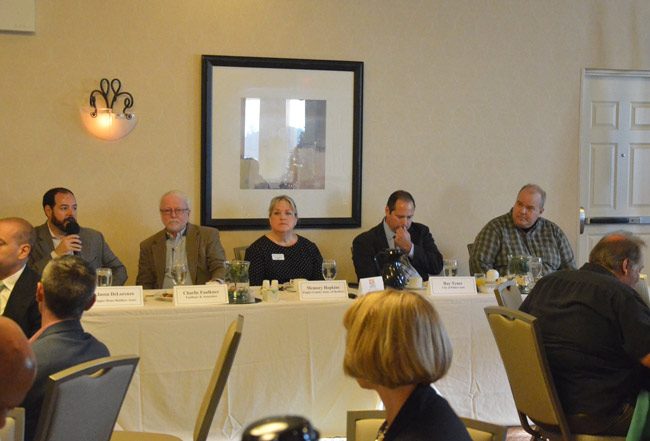 Panelists at this morning's Common Ground breakfast on development included, from left, Jason DeLorenzo, Charlie Faulkner, Memory Hopkins, Ray Tyner and Adam Mengel, a cross-section of Flagler's private and public development and regulatory sectors. (© FlaglerLive)