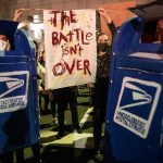 Protesters in support of counting all the mail-in votes gather outside of the Philadelphia Convention Center on Nov. 6, 2020.