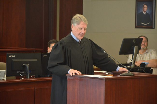 Circuit Judge Terence Perkins speaking at Flagler County's drug court graduation in  March, when four participants graduated. (c FlaglerLive)