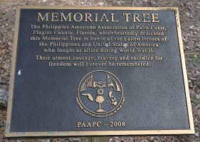 A plaque commemorating Philippinos and Americans wo fought as allies in World War II, at Heroes Park. Click on the image for larger view. (© FlaglerLive)