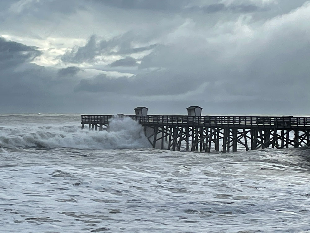 The pier was battered and will be closed pending an inspection. (© FlaglerLive)