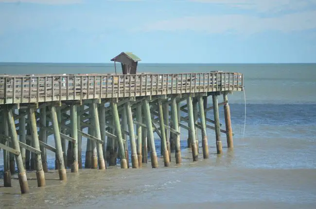 The Flagler Beach Pier lost 160 feet of its eastern end during Hurricane Matthew. It is scheduled to be repaired, but not restored to its original size, by May 1. (© FlaglerLive)