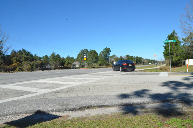 The intersection of Belle Terre Parkway and Pine Grove Drive was the scene of a fatal car crash for the second time in four years this morning. (c FlaglerLive)