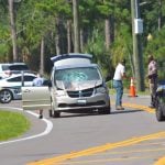 A minivan struck a pedestrian on Pine Lakes Parkway in Palm Coast this morning. (© FlaglerLive)