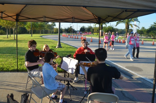 A quintet of the Flagler Youth Orchestra kept the runners strung up. Click on the image for larger view. (© FlaglerLive)