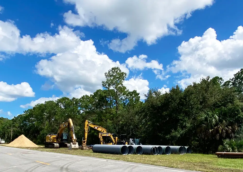Piping and materials have been trucked in for the replacement and repairs that will begin on Sept. 27 on the damaged piping beneath Royal Palms Parkway. 