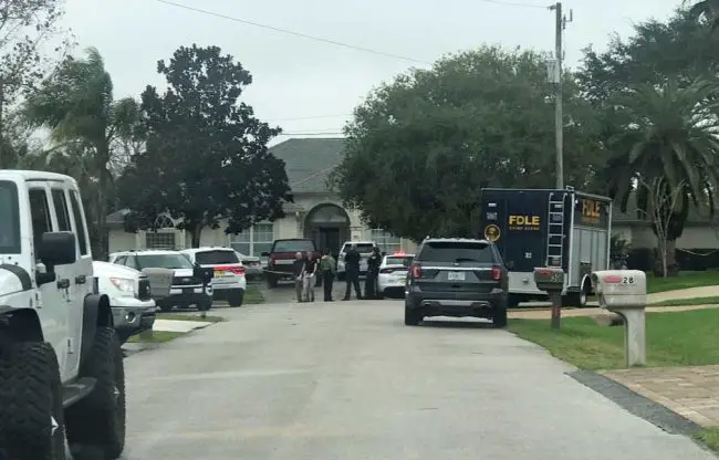 The heavy police presence at 34 Cleremont Court this morning in Palm Coast. (© FlaglerLive)