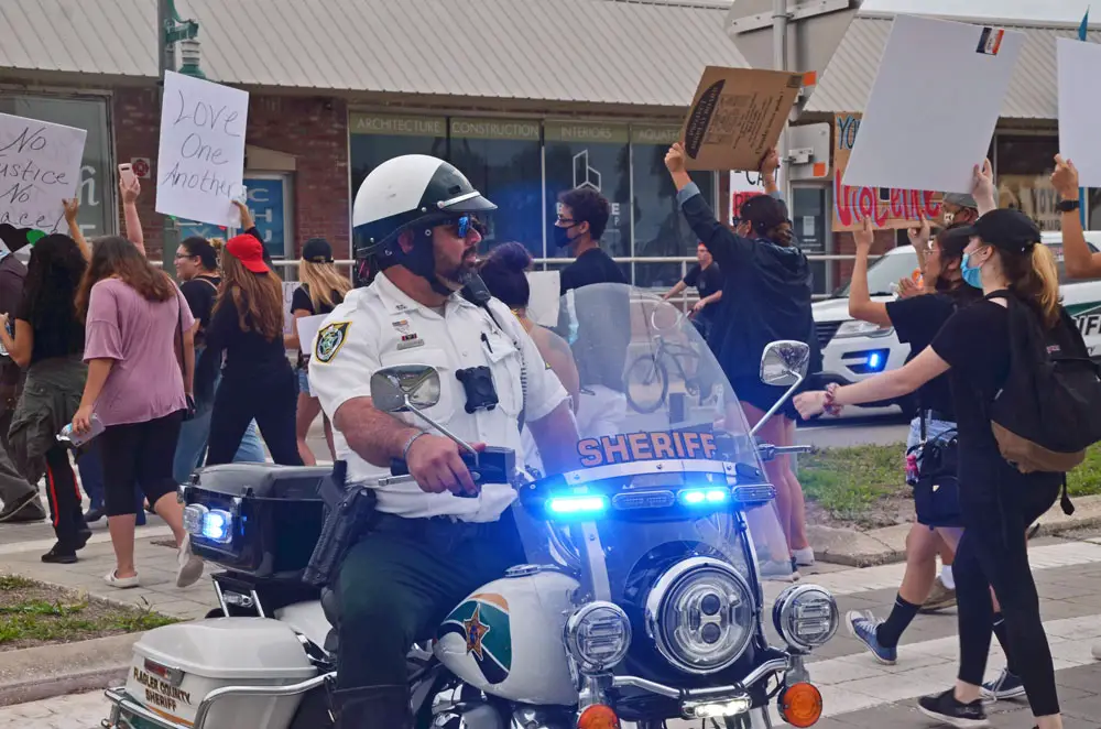 Policing in Flagler has never been at risk of "defunding," nor have relations between police and the community lacked for cohesion and respect. (© FlaglerLive)