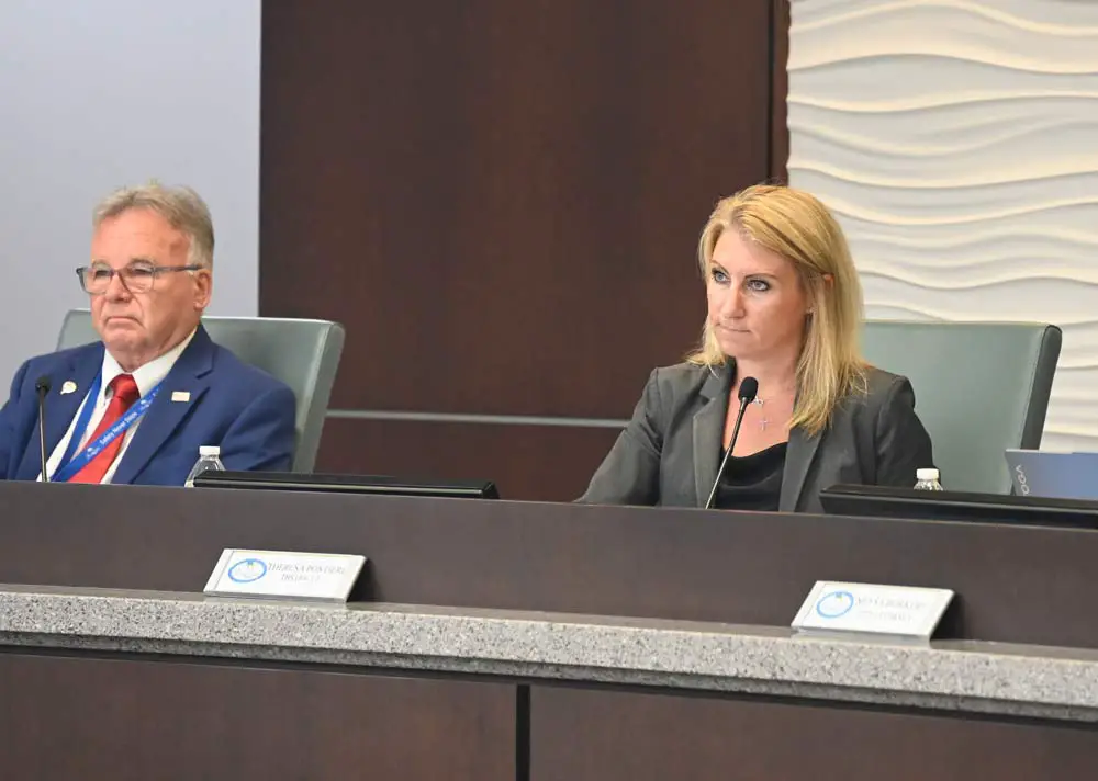 City Council member Theresa Pontieri, right, had proposed adopting a new franchise fee on electric utility bills conditional on a referendum guiding the rate. Council member Ed Danko opposed the fee in any form. The fee proposal died today. (© FlaglerLive)