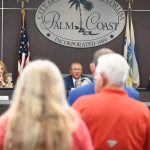 Palm Coast City Council member Theresa Pontieri, left, whose district includes the city's C-Section, the neighborhood most affected by short-term rentals, had championed the regulation ordinance from its inception. Mayor Mike Norris, center, brought it home. Council member Ray Stevens, right, had with fellow-member Charles Gambaro favored raising the guest-limit cap in some cases, but that proposal failed. The ordinance drew significant public input throughout its gestation. (© FlaglerLive)