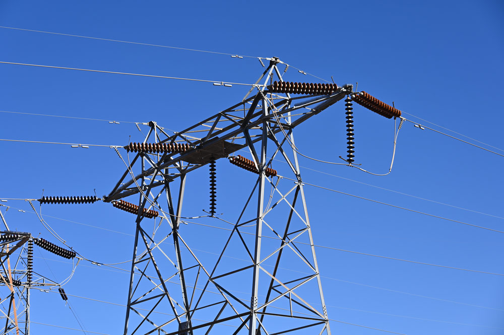 As power-hungry data centers proliferate, states are searching for ways to protect utility customers from the steep costs of upgrading the electrical grid, trying instead to shift the cost to AI-driven tech companies. (© FlaglerLive)