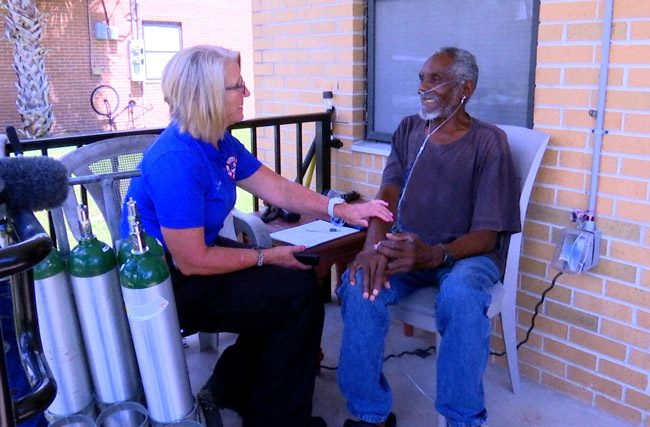 Flagler County Fire Rescue's Caryn Prather with one of her patients. (Flagler County)