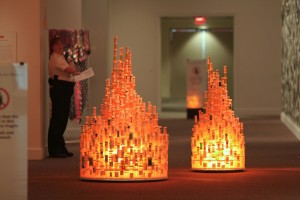 A detail from Jean Shin's 'Chemical Balance' installation at the Smithsonian, showing prescription pill bottles collected from nursing homes and arranged like stalagmites. Pill bottles similarly fall from the ceiling like stalactites, not shown in the image. (Mr. TinDC)