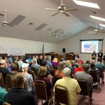 Preserve Flagler Beach and Bulow Creek--seen above leading a community meeting in late 2019--was organized as a community group two years ago to oppose The Gardens. (© FlaglerLive)