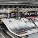 The presses aren't about to stop. (Bank Phrom on Unsplash)