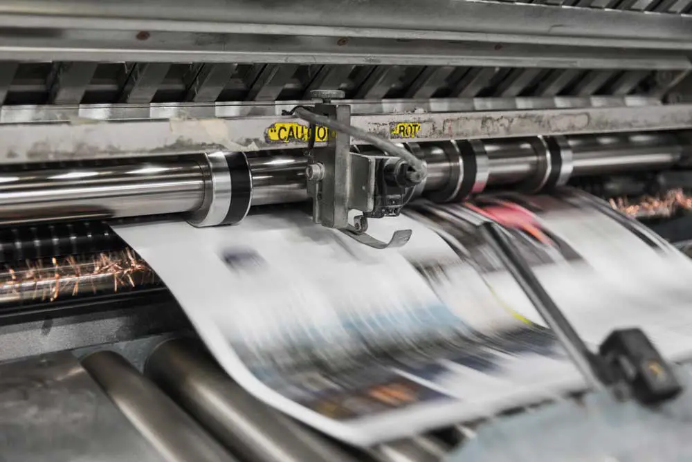 The presses aren't about to stop. (Bank Phrom on Unsplash)