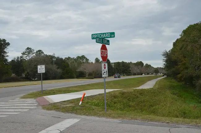 The intersection at Pritchard Drive and Belle Terre Parkway. The path from Buddy Taylor Middle School is heavily used by students on foot and on bikes. (© FlaglerLive)