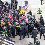 Pro-Trump protesters and police clash on Jan. 6, 2021, at the U.S. Capitol. Lev Radin/Pacific Press/LightRocket via Getty Images)