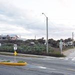 Ted Barnhill bought this lot at State Road A1A and South 17th Street 50 years ago, with plans to use it commercially. He has submitted a plan for a three-story building of eight one-bedroom vacation rental units. The City Commission is uncomfortable with the plans, primarily because of how parking would depend on the alley in back of the property. (© FlaglerLive)