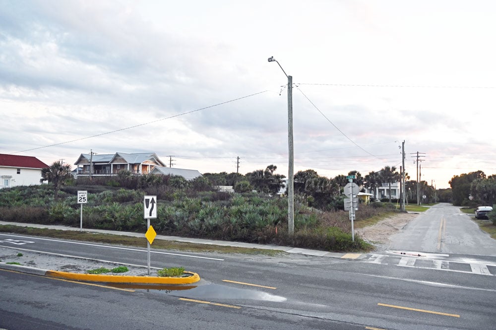 Ted Barnhill bought this lot at State Road A1A and South 17th Street 50 years ago, with plans to use it commercially. He has submitted a plan for a three-story building of eight one-bedroom vacation rental units. The City Commission is uncomfortable with the plans, primarily because of how parking would depend on the alley in back of the property. (© FlaglerLive)