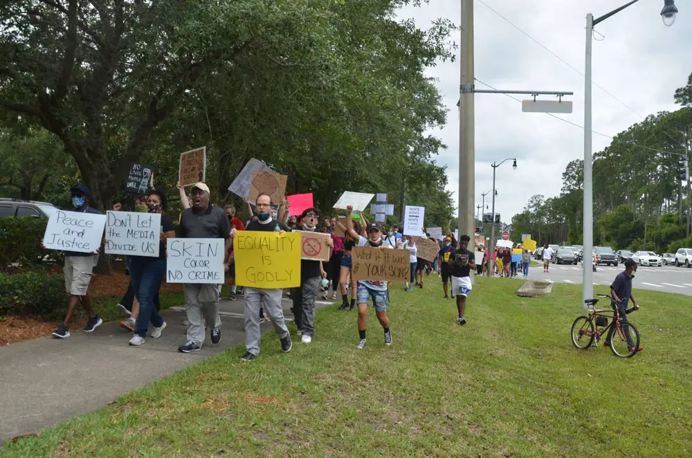 Last June's Black Lives Matter protest in Palm Coast. (© FlaglerLive)